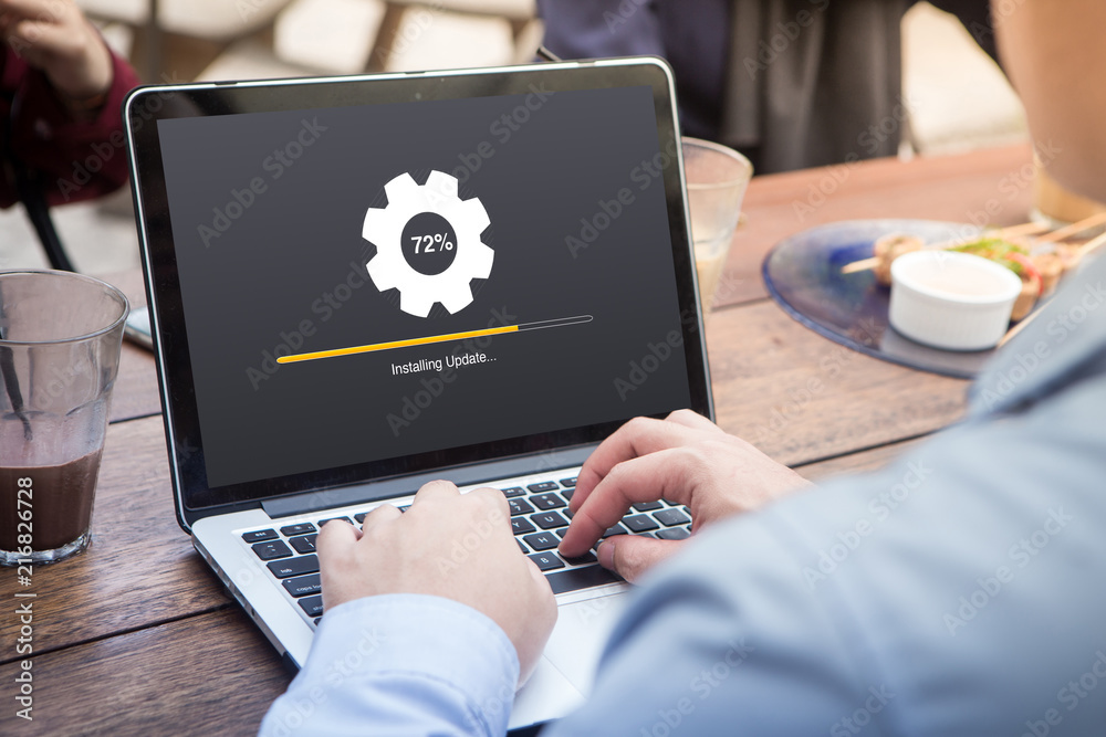 Businessman waiting for installing update process with gearbox ...