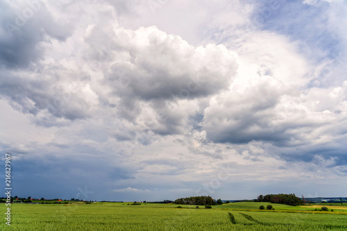  beautiful landscape. Clouds passing above rural fields in South Moravia, Czech Republic.
