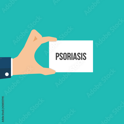Man showing paper PSORIASIS text
