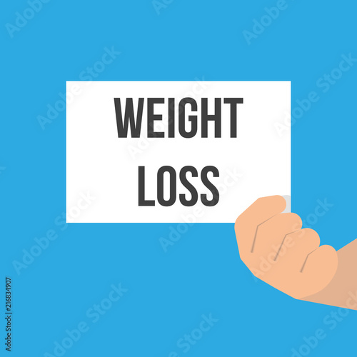 Man showing paper WEIGHT LOSS text