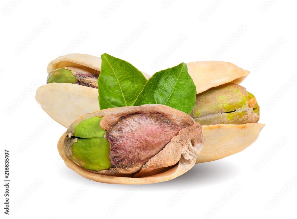 Pistachios with leaf isolated on white background Pistachios with leaf isolated on white background