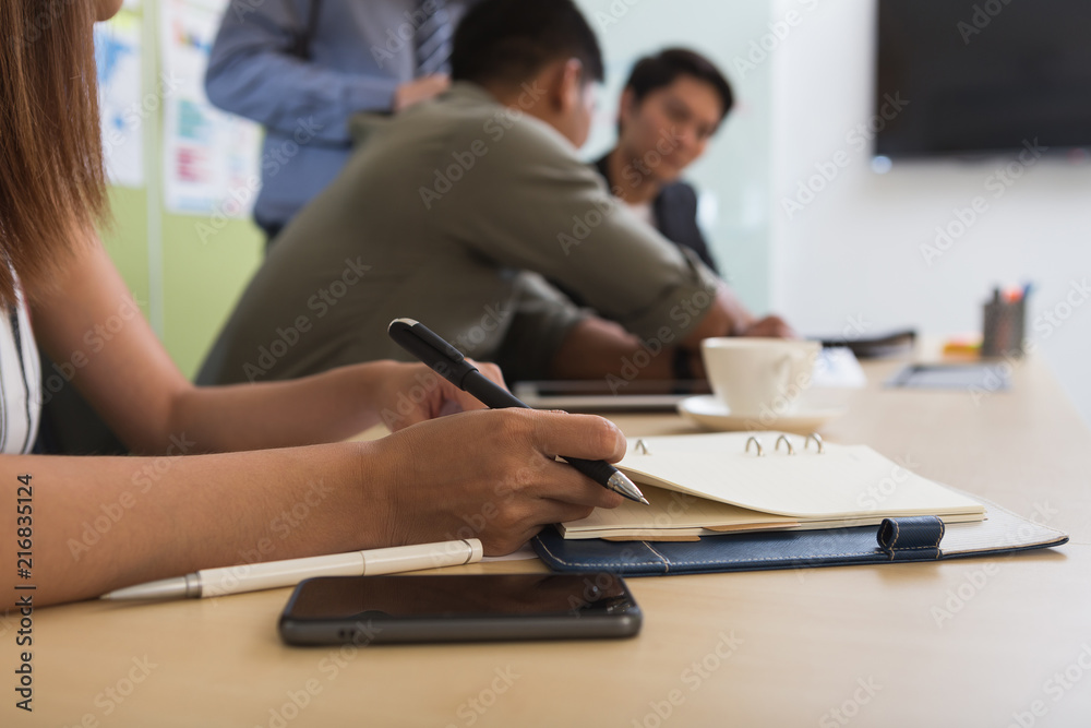 Businessman and team talking and briefing of business plan and strategy at meeting room Businessman and team talking and briefing of business plan and strategy at meeting room