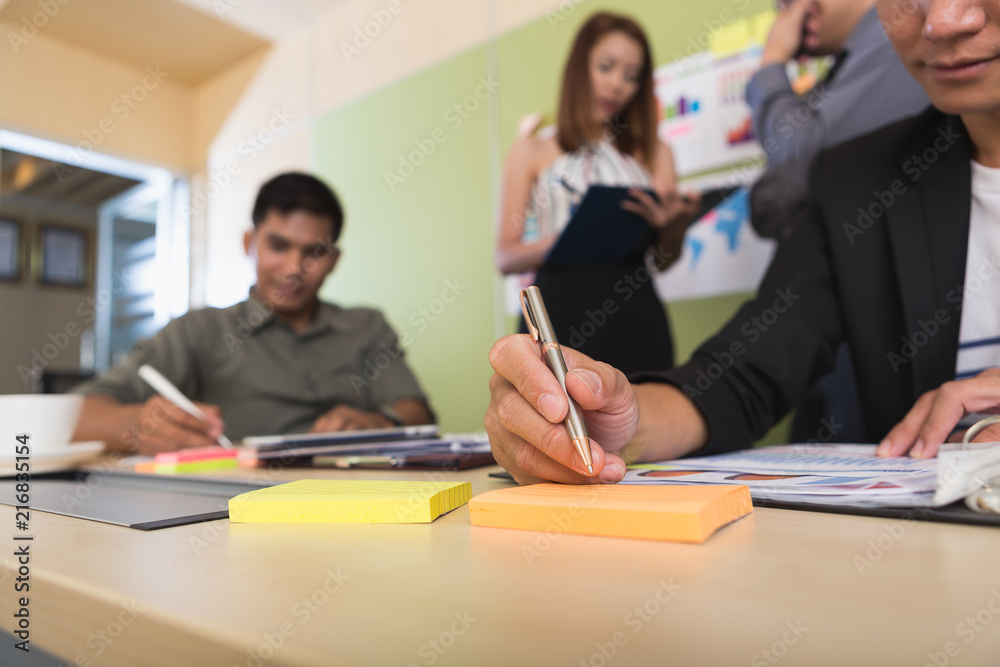 Businessman and team talking and briefing of business plan and strategy at meeting room Businessman and team talking and briefing of business plan and strategy at meeting room