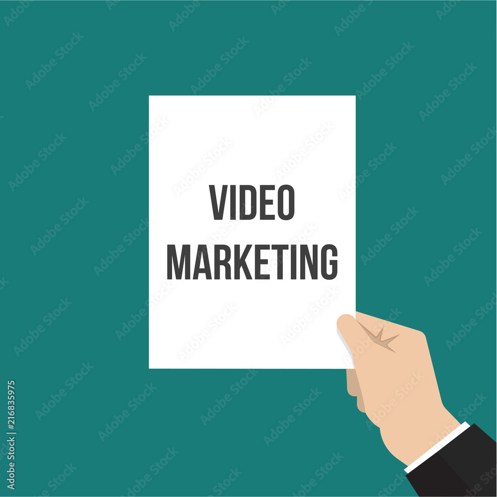 Man showing paper VIDEO MARKETING text Man showing paper VIDEO MARKETING text