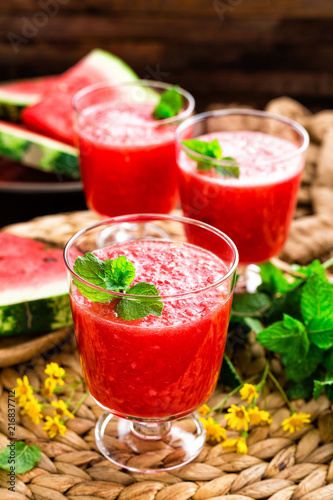 Watermelon smoothie. Watermelon drink  cocktail on wooden rustic background