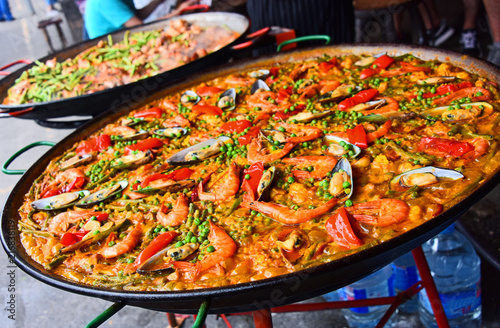 Spanish paella prepared in the street restaurant
