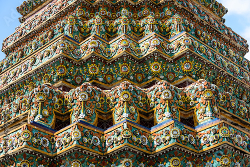 Close up beauitful mosaic tiles of large stupas in Wat Pho or Wat Phra Chetuphon Vimolmangklararm Rajwaramahaviharn is one of Bangkok's oldest temples, THAILAND photo