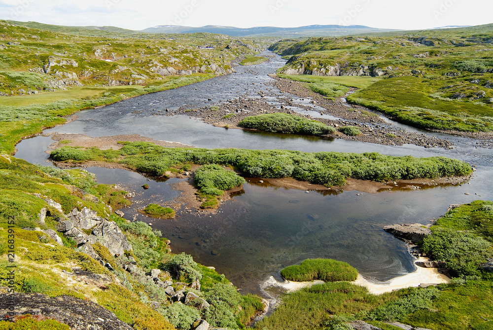 Magnificent summer landscape of the Hardangervidda mountain plateau and National park in Norway. Magnificent summer landscape of the Hardangervidda mountain plateau and National park in Norway.