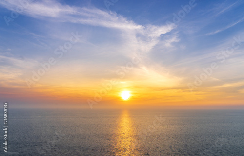 scenic of sunset on seascape skyline background