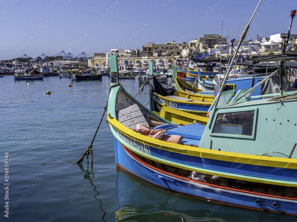 Maltese traditional fishing boat at the harbor of Marsaxlokk Malta
