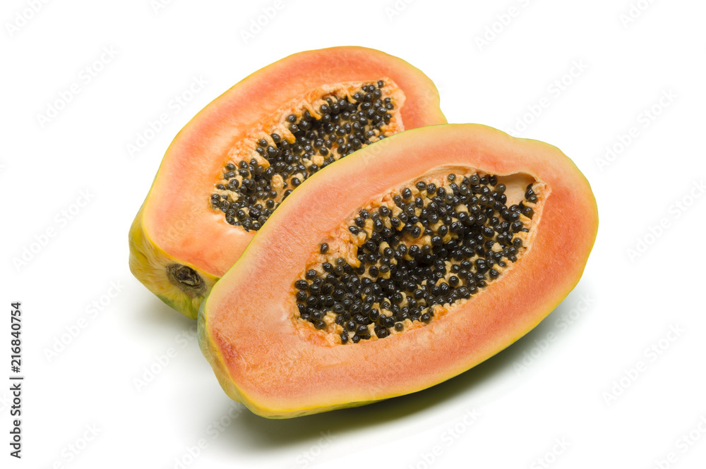 Papaya, halves of fresh juicy orange tropical fruit isolated on white background, healthy food, diet and nutrition Papaya, halves of fresh juicy orange tropical fruit isolated on white background, healthy food, diet and nutrition