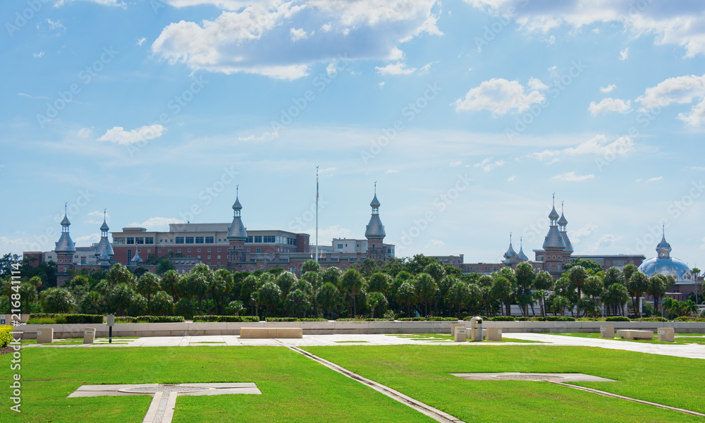 Obraz premium University of Tampa in Florida with Moorish minaret towers, a highly accredited college, with a colorful blue sky on a bright sunny afternoon.