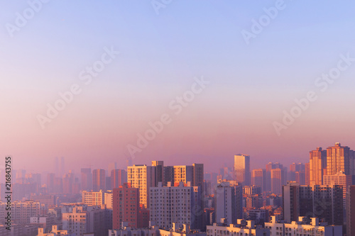 Urban concept: big city in the soft light of the morning