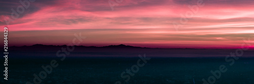 Silhouette panorama mountain and natural light sunset. In the morning, instagram style filter photo vintage tone