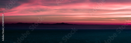 Silhouette panorama mountain and natural light sunset. In the morning, instagram style filter photo vintage tone © Akira Kaelyn