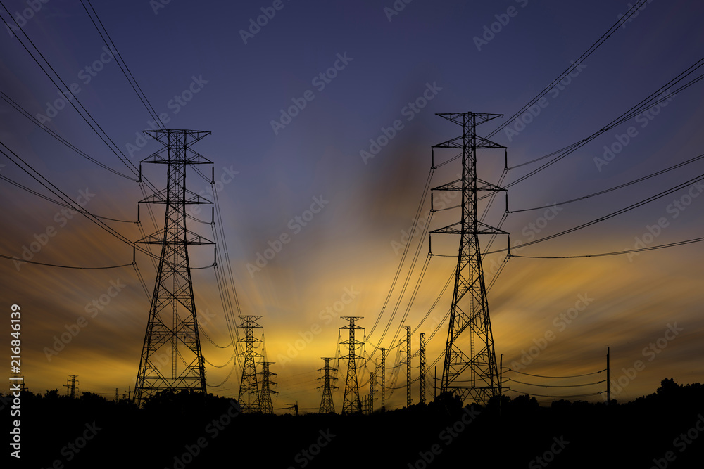 High voltage electric tower on sunset time and sky on sunset background. Power Tower