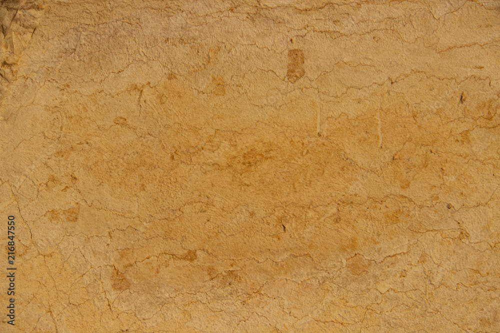 Fototapeta premium Stone background light yellow color