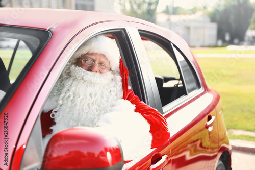 Authentic Santa Claus in car, view from outside © New Africa