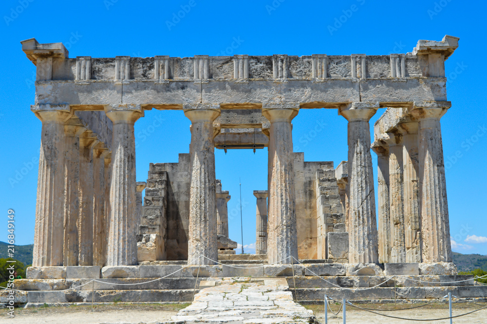 AEGINA, GREECE - JUNE 19: The Temple of Aphaia in Aegina, Greece on June 19, 2017. AEGINA, GREECE - JUNE 19: The Temple of Aphaia in Aegina, Greece on June 19, 2017.