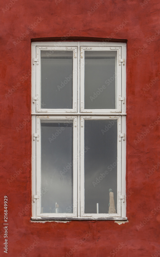 Window on the colorful facade
