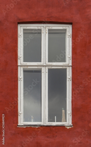 Window on the colorful facade