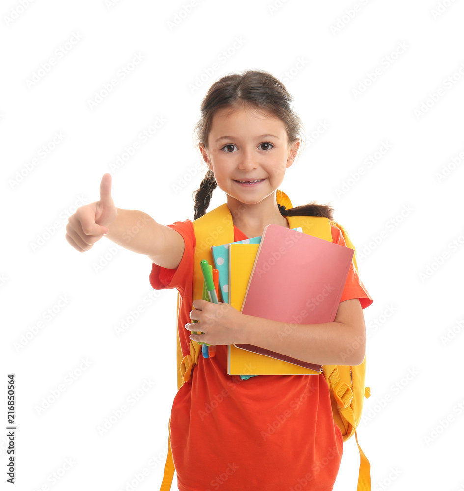 Cute child with school stationery on white background Cute child with school stationery on white background