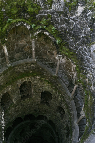 Initiation Well, Sintra, Quinta da Regaleira. Old spiral staircase goes down. Pozo iniciático photo