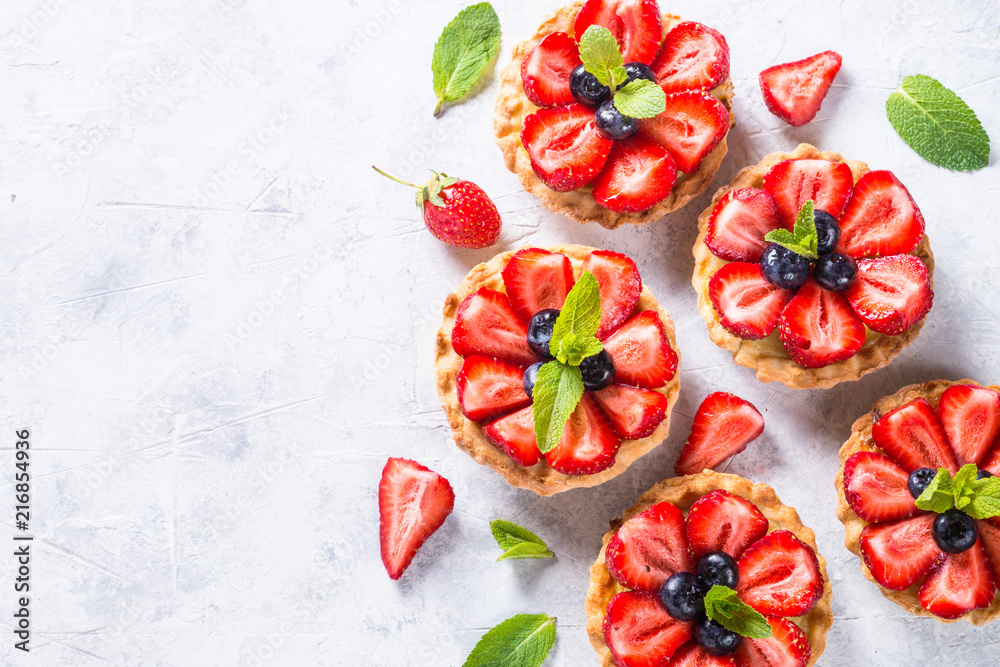 Strawberry tart on white. Summer dessert with berries - obrazy, fototapety, plakaty 