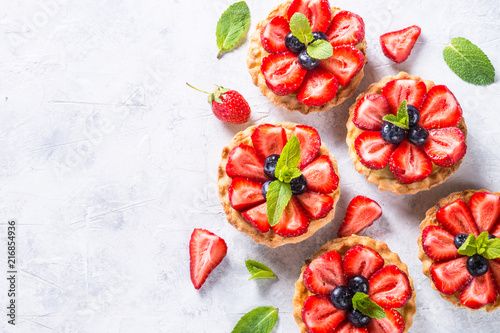 Strawberry tart on white. Summer dessert with berries