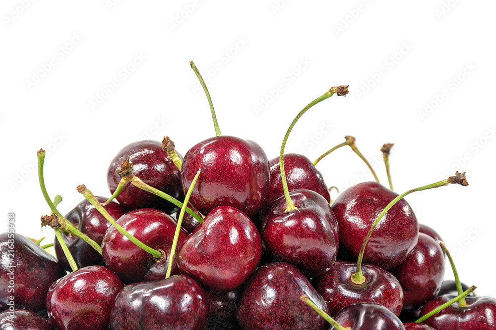 close up of ripe red cherries on white background close up of ripe red cherries on white background