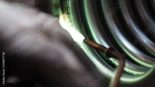 Braze welding process in a metalworking company.