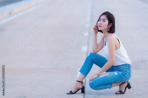 Portrait of beautiful asian woman gold hair outdoor,Happy woman concept,Lifestyle of modern girl,Thailand people