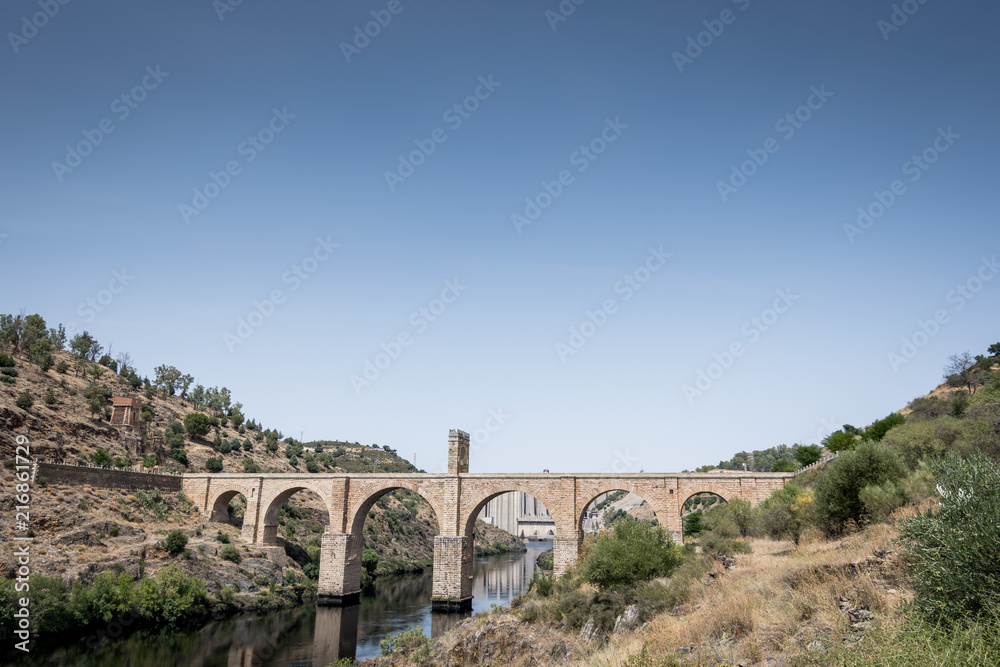 Roman bridge over the Tagus River in the city of Alcantara (Caceres, Spain)