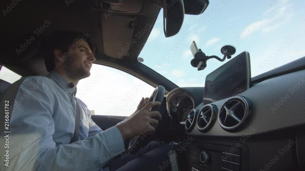 Young Man Is Driving A Car Young Man Is Driving A Car