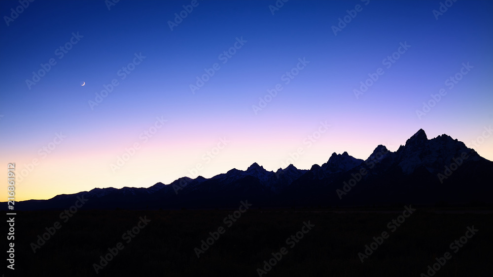 Silhouette of Teton Mountain Range at night, Grand Teton National Park, Wyoming, USA.
