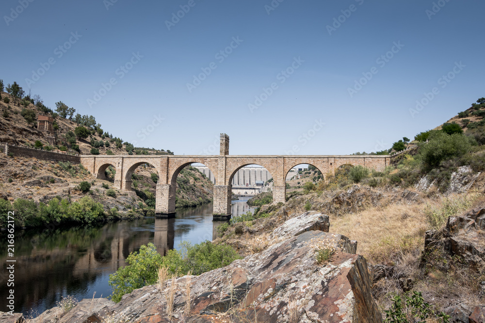 Roman bridge over the Tagus River in the city of Alcantara (Caceres, Spain)