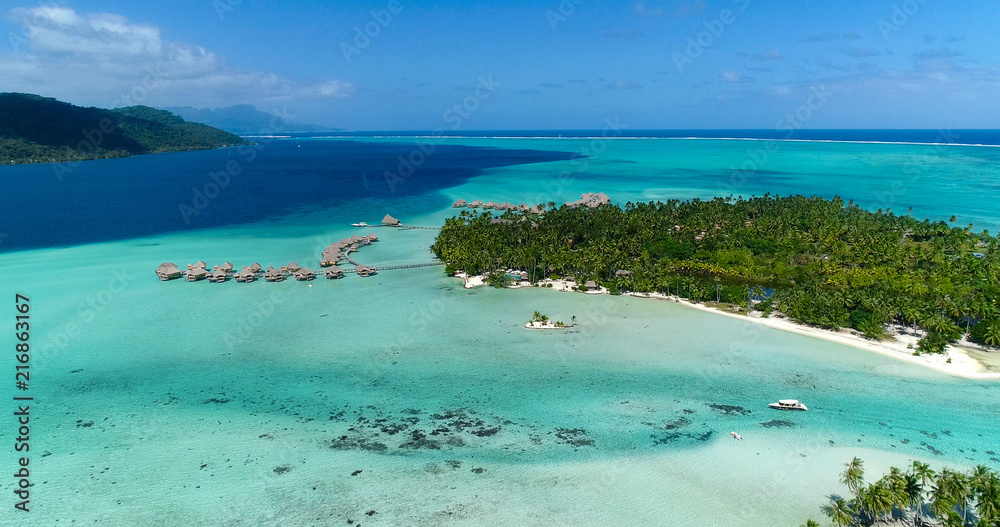 Water bungalows resort at islands, french polynesia in aerial view Water bungalows resort at islands, french polynesia in aerial view