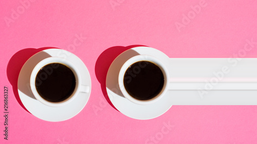Long Banner Two White Cups of Coffee with Saucer on Fuchsia Pink Background. Top View. Morning Breakfast Energy Caffeine Addiction. Minimalist. Hard Sunlight. Pop Art 80s Style. Pixel Stretch Glitch