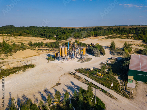 Aerial view from drone to sand pit, sunny day, Russia photo