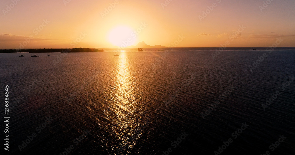 sunset on an islet in French Polynesia
