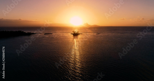 sunset on an islet in French Polynesia