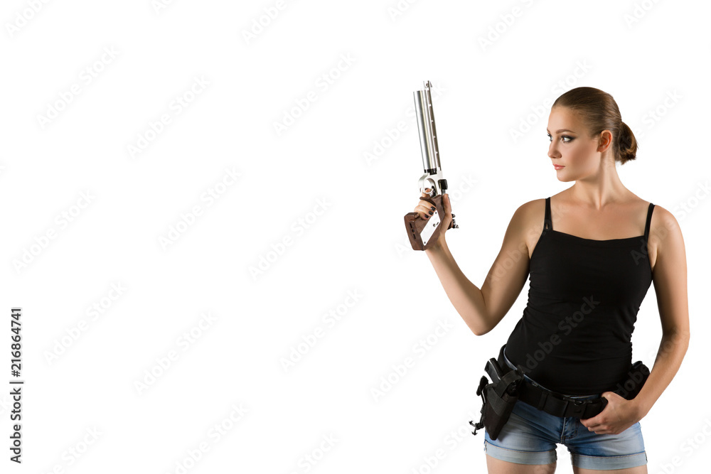 Young beautiful woman holding a sport gun on white background Young beautiful woman holding a sport gun on white background