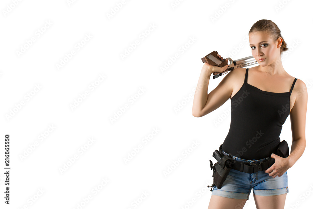 Young beautiful woman holding a sport gun on white background Young beautiful woman holding a sport gun on white background