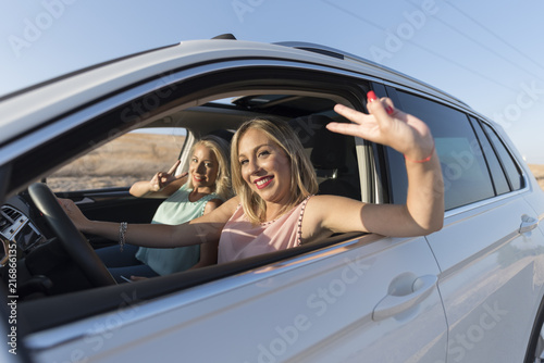 Two happy sister in car happy and smiling after shopping © FotoAndalucia
