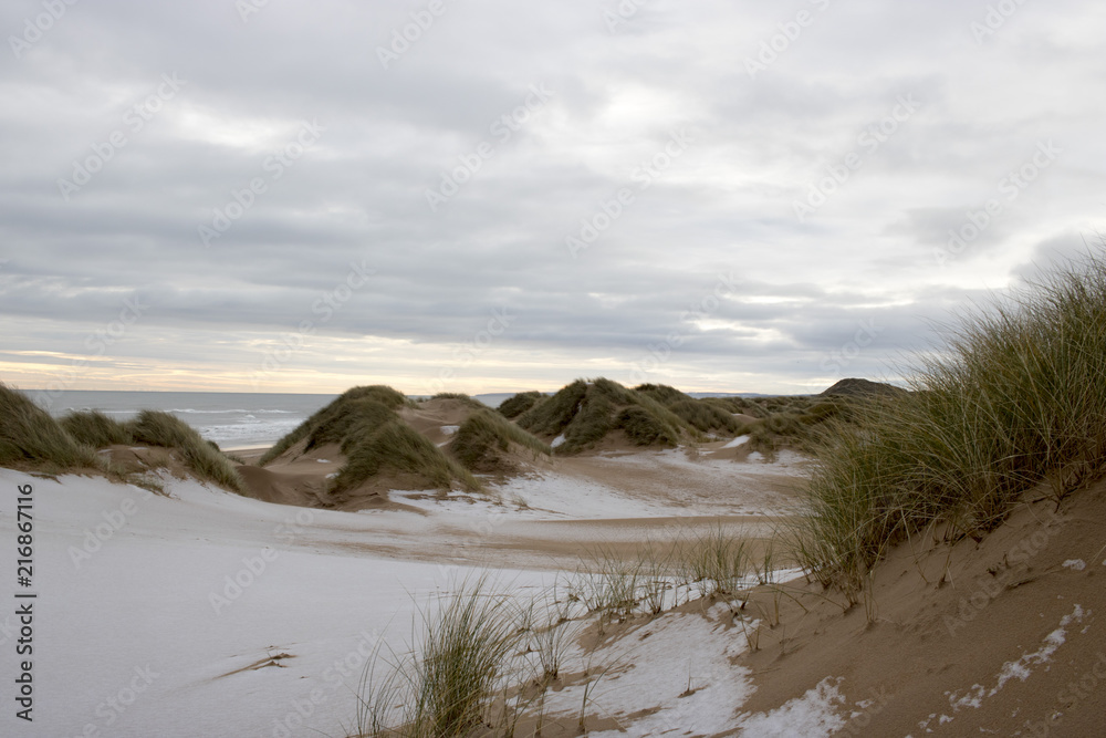 View of Snow Covered Beach in the Evening View of Snow Covered Beach in the Evening