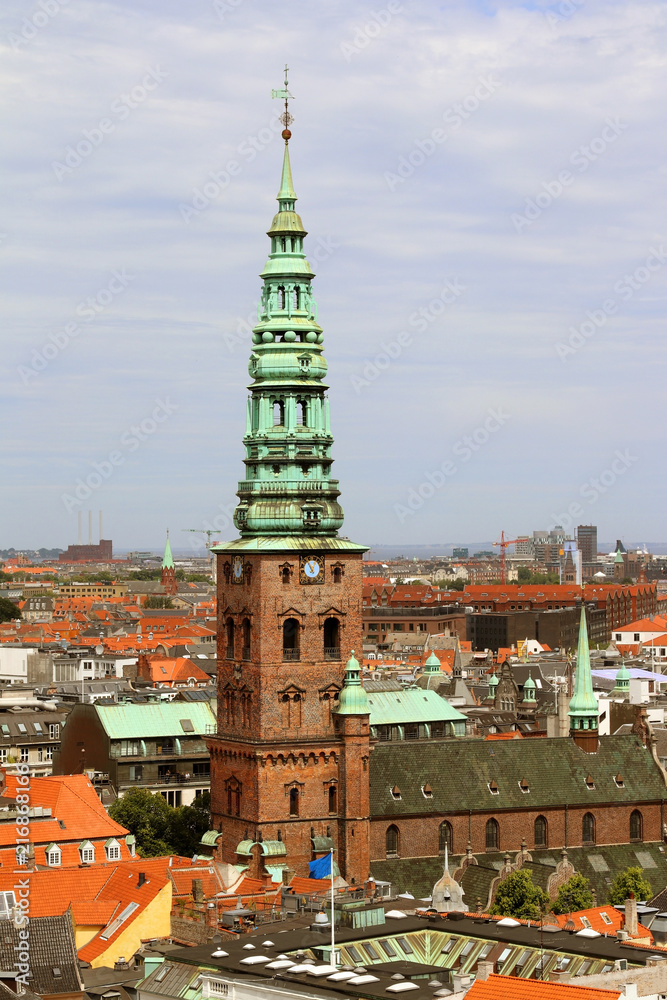  The tower building Nikolaj Church, original church, medieval period, renaissance style copper-clad spire, Copenhagen, Denmark.