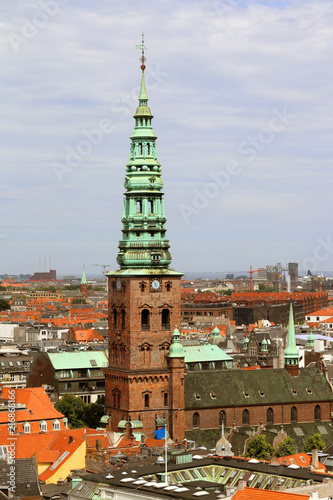  The tower building Nikolaj Church, original church, medieval period, renaissance style copper-clad spire, Copenhagen, Denmark.