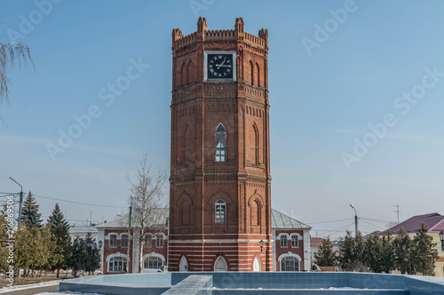Old clock tower in the town square. photo