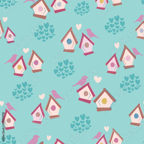 Multi-colored birdhouses and birds. Seamless background pattern. Clusters of hearts. Turquoise background.