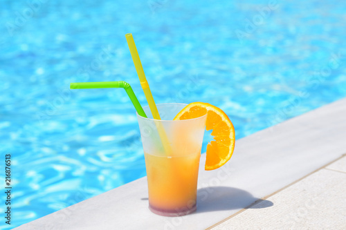 Orange juice on the swimming pool